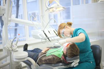A patient getting a dental cleaning