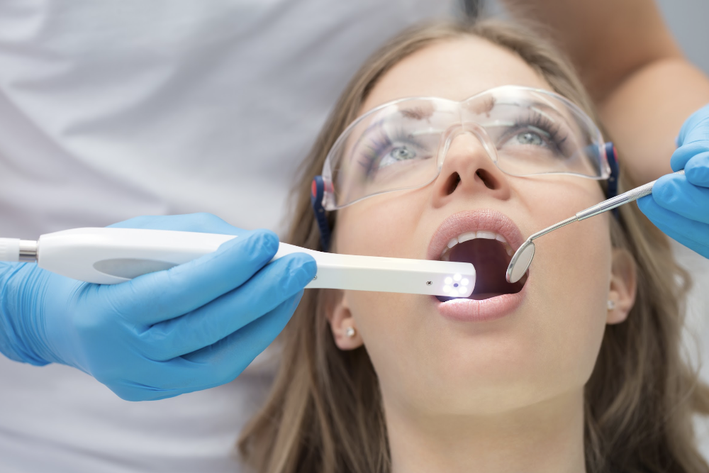 A woman receiving a dental exam in langhorne
