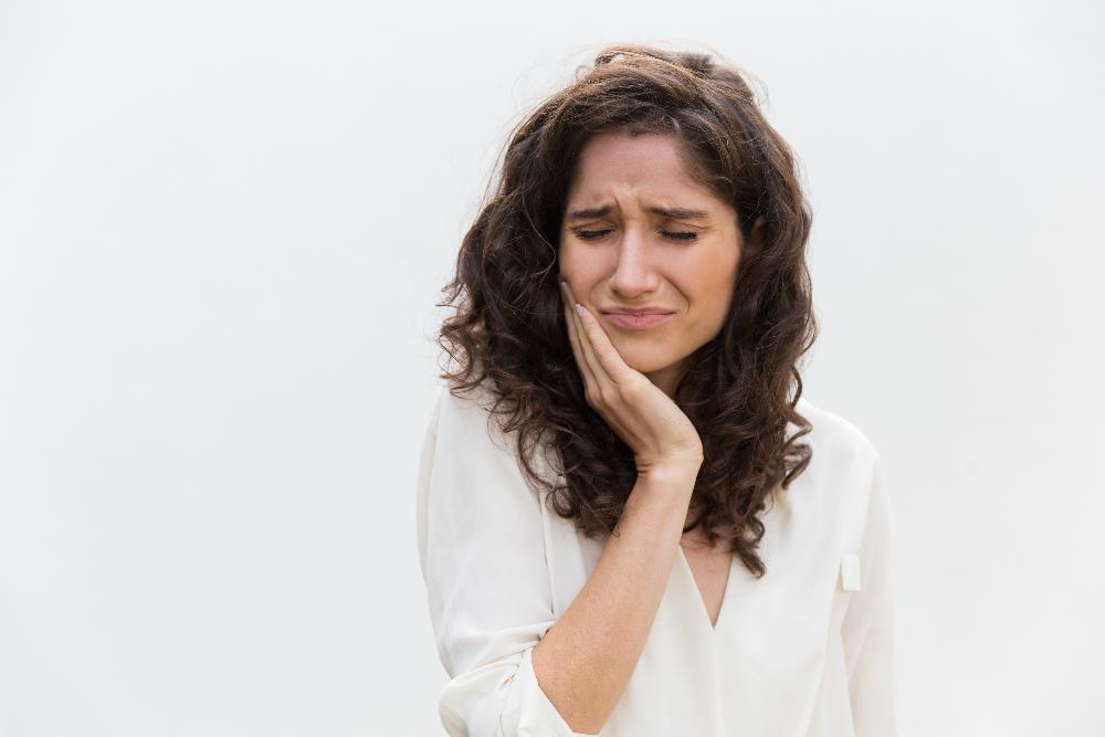 A woman having a dental emergency