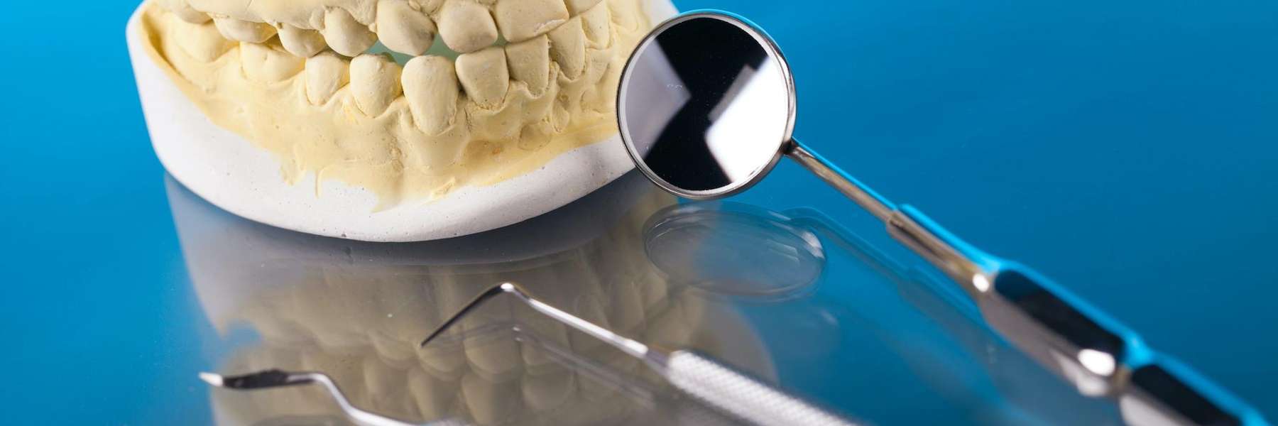 A dental mold and dental tools | dentist in Langhorne, PA