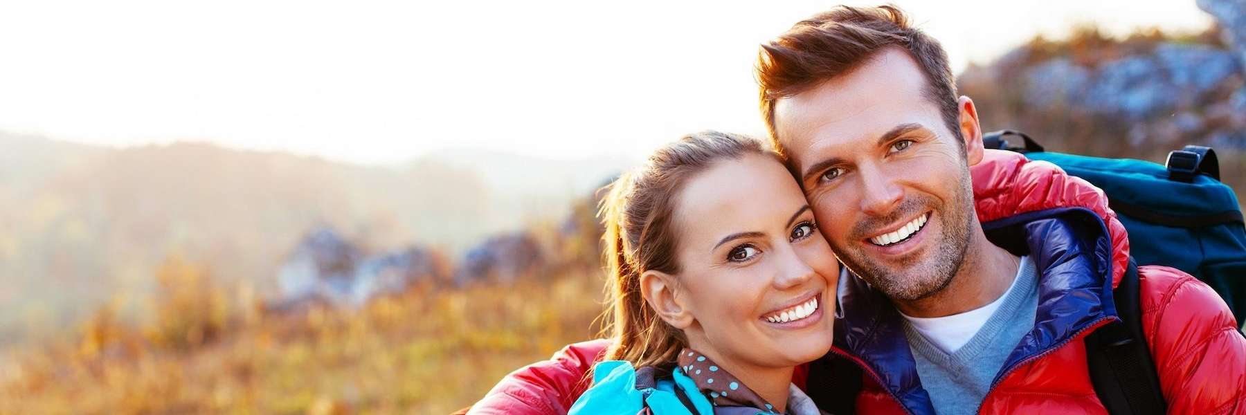 A smiling couple on a hike in Langhorne